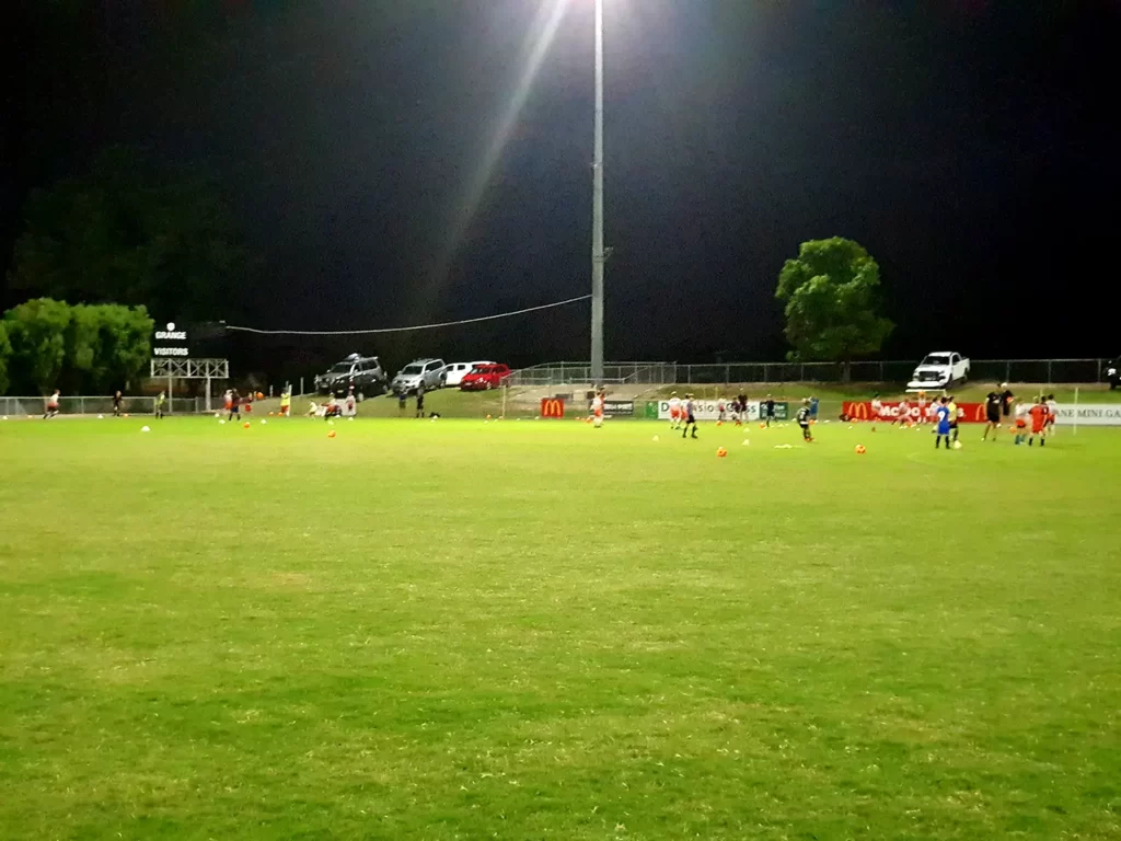 suburban soccer field at night