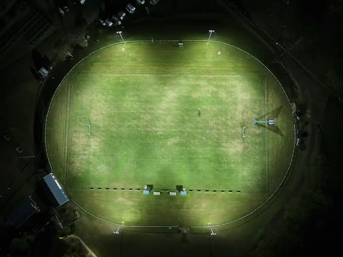 drone image of rugby field lit at niht