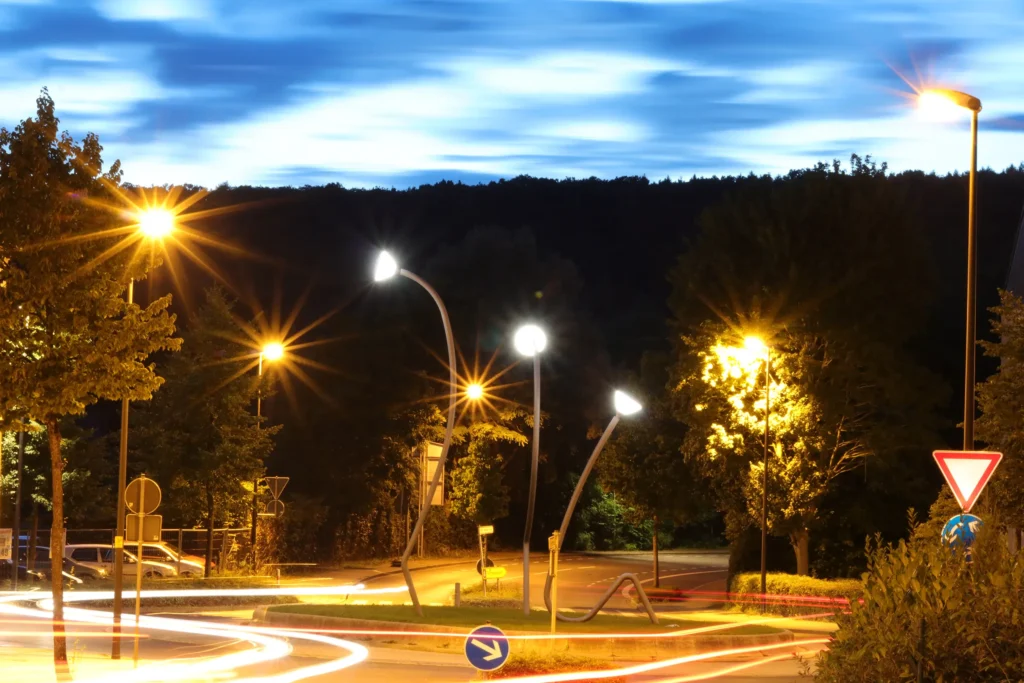 illuminated-light-trails-road-against-sky-night 